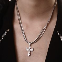 Introducing the Angel Wing Cross Necklace—a divine blend of elegance and durability. Elegant Necklace With Silver Chain And Cross Pendant, Elegant Cross Pendant Necklace With Silver Chain, Elegant Silver Chain Cross Necklace, Spiritual Stainless Steel Clavicle Chain Necklace, Elegant Nickel-free Cross Jewelry, Spiritual Stainless Steel Clavicle Necklace, Silver Spiritual Clavicle Chain Necklace, Elegant Silver Cross Necklace With Chain, Elegant Silver Metal Cross Necklace