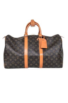 Travel in style with the Louis Vuitton Keepall 45. Featuring a classic brown monogram print and vachetta leather trim, handles, and luggage tag, this bag is the perfect blend of luxury and functionality. And it doesn't hurt to show off a little on your travels. Made in USA Coated canvas Vachetta Leather trims, handles, and luggage tag Double top zipper Attached lock without key Date code: SD0929 Minor watermarks Height 12" Width 18" Depth 8" Handle drop 4" Rectangular Brown Luggage For Shopping, Luxury Rectangular Luggage With Handles, Luxury Travel Bag In Monogram Canvas, Brown Travel Bag With Luggage Sleeve For Shopping, Classic Monogram Canvas Travel Bag For Business, Brown Monogram Canvas Bags For Business Trips, Designer Brown Bags For Business Trips, Business Travel Bag With Luggage Sleeve In Monogram Canvas, Business Luggage In Monogram Canvas