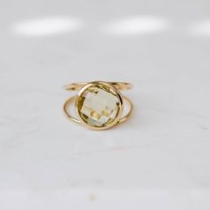 Lemon Quartz ring with double band in 14K solid gold. A modern and timeless stone ring with a natural quartz gemstone. A perfect gem gold ring for women, dainty and subtle that adds glam to every outfit. The best for her. 100% handcrafted with love!D E T A I L S● Metal: 14K solid gold or 14K white gold or 14K rose gold● Gemstone: Lemon Quartz, briolette cut● Stone Diameter: 10mm (0.4in) or 12mm (0.5in)R I N G ∙ S I Z I N GFor General Reference:● we use standard US Ring Sizing● an average women's Modern Gold Birthstone Ring With Gemstone, Modern Gold Gemstone Birthstone Ring, Modern Gold Crystal Ring With Gemstone, Modern Everyday Yellow Gold Crystal Ring, Modern Gold Stackable Rings With Birthstones, Modern Gold Stackable Birthstone Rings, Modern Gold Stackable Rings With Gemstones, Modern Yellow Gold Crystal Ring For Everyday Use, Modern Gold Stackable Gemstone Rings