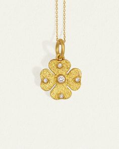 The 4 leaf Clover Necklace is handcrafted from 24k solid gold & natural diamonds. Shop pure gold pendant necklace inspired by good luck talismans. Gold Diamond Necklace With Flower Shape For Gifts, Gold Diamond Necklace In Flower Shape For Gift, Amulet Style Yellow Gold Flower Pendant Jewelry, Yellow Gold Good Luck Pendant Necklace, Yellow Gold Amulet-style Flower Pendant Jewelry, Gold Flower Pendant Necklace For Good Luck, Yellow Gold Pendant Necklace For Good Luck, Yellow Gold Necklace With Single Cut Diamond Flower Pendant, 22k Gold Flower Pendant Necklace Gift