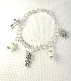 Birthday Gift for Girls - My First Charm Bracelet - Daughter Charm Bracelet - Jewelry for Children - Personalized Charm Bracelet - SCC1253 This listing is for one 6 inch Silver Plated Charm Bracelet. For a larger or smaller sized chain, please include your desired size in a message to us upon checkout. Bracelet comes as pictured, including all charms (letter initial charm, little girl charm, 2 white bead charms, flower charm). For additional charms, please look through our selection here: https: White Charms Bracelets For Birthday Gift, Cute Silver Charm Bracelet For Birthday, White Charm Bracelet For Birthday, Adjustable White Charm Bracelet For Birthday, Nickel-free White Charm Bracelet As Gift, White Hypoallergenic Charm Bracelet For Birthday, Nickel-free White Charm Bracelet Gift, Hypoallergenic White Charm Bracelet For Birthday, White Nickel-free Charm Bracelet As Gift