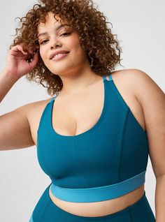 Matching style(s): Search 42655200 FIT Wireless cups. Lightly lined. Measures 18” from shoulder (size 2). Low-impact. MATERIALS + CARE Performance Rib knit fabric. 76% nylon, 24% Lycra. Machine wash cold. Tumble dry low. Imported. DETAILS Deep v-neck. . Fixed straps. Strappy back. The best plus size women's low impact wireless rib active sports bra caged & strappy bras in gulf coast made of performancerib. Torrid is your destination for cozy fall and winter clothes to keep you warm and comfortab Blue Nylon Sports Bra With Built-in Padding, Casual Compressive Blue Sports Bra, Casual Blue Sports Bra With Built-in Padding, Blue Stretch Nylon Sports Bra, Blue Nylon Sporty Sports Bra, Sporty Blue Nylon Sports Bra, Blue Medium Support Nylon Sports Bra, Blue Nylon Sports Bra With Medium Support, Blue Compressive Nylon Sports Bra