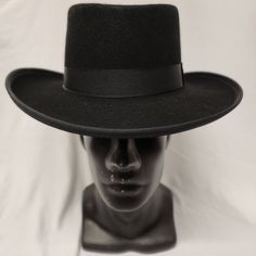 Excellent Quality Low Crowned Wool Felt With Satin Band. Brim: 3" Height: 4.5" Size: S, M, L, Xl 2xl Color: Black Size Guide: American / Nearest 1/8 Inch / Metric Cm / Size Code 6 3/4 21 1/8 54 Small 6 7/8 21 1/2 55 Small / Child L 7 21 7/8 56 Medium 7 1/8 22 1/4 57 Medium 7 1/4 22 5/8 58 Large 7 3/8 23 59 Large 7 1/2 23 1/2 Classic Fedora Costume Hat For Winter, Classic Black Wide Brim Costume Hat, Classic Winter Costume Hats And Headpieces, Classic Wide Brim Winter Costume Hats And Headpieces, Classic Fitted Fedora Costume Hat, Classic Wide Brim Winter Costume Hat, Black High Crown Felt Hat For Winter, Winter High Crown Black Felt Hat, Classic Black Fedora Costume Hat