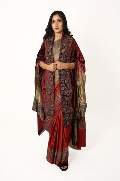 Complement your outfit with this Royal Velvet Cape. It is effortless to style the cape, and it can be paired with any top, blouse, dress, or any other thing, no doubt you'll stand out from the crowd. Product Details - Condition Brand New  - Style: Cape Shawl - Fabric: Silk Velvet  - Embroidery: Tilla Thread Embroidery - Colour: Ombre Fawn/ Maroon - Embroidery Color: Gold - Size: 88" X 38" (225 cms X 96.52 cms) approx. - One Size Fits All If you want a bigger or smaller size(dimensions), we can m Maroon Embroidery, Velvet Shawls, Tilla Embroidery, Velvet Embroidery, Cape Shawl, Velvet Cape, Capes & Ponchos, Thread Embroidery, Fabric Silk