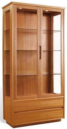 a wooden bookcase with glass doors on the front and bottom shelves in different sizes