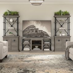 a living room filled with furniture and a flat screen tv on top of a wooden entertainment center