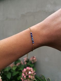 "Simple and dainty lapis lazuli bar chain bracelet Made from PVD gold plated stainless steel and jewelry wire so you can wear it every day without worries about the gold tone - the metal is sweatproof and waterproof Adjustable lenght 16 - 21 cm = 6.3\" - 8.3\" Looks nice also in stack, take a look at our herringbone chain bracelet here https://cutt.ly/5wfS19ZW Lapis lazuli is gem which is considered the alternative birthstone for the month of September You will recieve your jewelry nicely packed Minimalist Adjustable Lapis Lazuli Jewelry, Adjustable Minimalist Lapis Lazuli Jewelry, Gold Lapis Lazuli Bracelets For Gift, Minimalist Blue Bracelet With Delicate Chain, Dainty Lapis Lazuli Jewelry For Gift, Dainty Lapis Lazuli Jewelry Gift, Minimalist Blue Bracelet With Adjustable Chain, Minimalist Lapis Lazuli Jewelry For Gift, Minimalist Lapis Lazuli Jewelry Gift