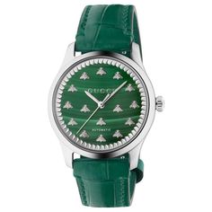 From Gucci, the G-Timeless collection continues to explore emblematic House codes in new ways each season. This automatic watch is designed with a green malachite stone dial, paired with a green alligator leather strap. The emblematic bee motif enriches the style. 38mm steel case Green malachite stone dial with bees Green leather strap Sapphire glass with antireflective coating 5 ATM (164 feet/50 meters) Power reserve: 38 hours Automatic movement Wrist size from 150mm to 190mm Gucci Style #: YA1 Diamonds Direct, Timeless Watches, European Jewelry, Gucci Style, Green Watch, Gucci Watch, Green Malachite, Malachite Stone, Gucci Fashion