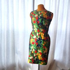 A Classic Design By Oscar De La Renta. This Dress Features: * Rounded Neckline * Inner Lining * Inner Belt Construction * Back Zipper * 100% Silk Size 8 Bust - 36" Waist - 30" Vibrant Fitted Green Dress, Floral Silk Dress, Oscar Dresses, Silk Floral Dress, Rounded Neckline, Green Yellow, Silk Dress, Classic Design, Silk