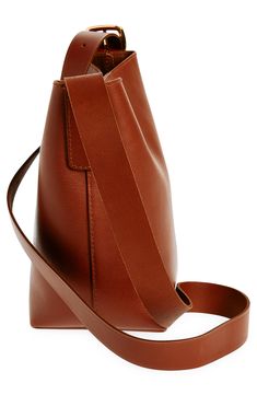 Madewell's newest leather bag collection is cool, modern and quietly luxe. With a magnetic closure and interior pocket, the mini bucket tote is perfectly sized to hold your phone, wallet, keys and more—plus, it has a shoulder strap and adjustable crossbody strap. It's so good, it's essential. Structured silhouette with flat base for stability Leather Imported Modern Rectangular Bucket Bag For On-the-go, Versatile Brown Bucket Bag For On-the-go, Cognac Bucket Bag For On-the-go, Modern Bucket Bag With Leather Handles For On-the-go, Elegant Cognac Bucket Bag For On-the-go, Brown Smooth Grain Bucket Bag For Work, Brown Bucket Bag For Work, Trendy Rectangular Bucket Bag For Work, Smooth Grain Top Handle Bucket Bag For Work