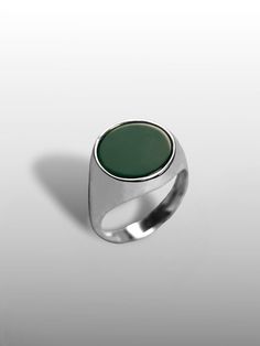 Discover the captivating allure of our Big Round Green Agate Ring, a stunning piece crafted in high-quality sterling silver and adorned with a vibrant green agate stone. This fashionable signet ring is designed for men who appreciate unique and stylish accessories, making it a perfect addition to any jewelry collection. The rich, deep green hue of the agate, reminiscent of lush moss, adds a touch of nature-inspired elegance, while the option of 14K or 18K gold accents elevates its luxurious appe Luxury Agate Gemstone Men's Ring, Luxury Men's Agate Gemstone Ring, Signet Ring For Men, Green Agate Ring, Modern Wedding Rings, Accessories Making, Mother Rings, Gold Gemstone Ring, Bold Jewelry