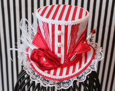 image 1 Themed Red Party Hat, Adjustable Themed Top Hat For Party, Themed Mini Party Hats, Themed Party Mini Cap Hat, Themed Party Mini Cap, Whimsical Party Costume Cap, Whimsical Party Costume Hats And Headpieces, Themed Top Hat For Carnival Party, Fitted Mini Hats For Themed Events