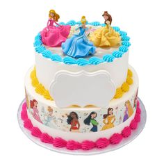 a three tiered cake with princesses on it