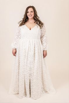 The Rue Gown is perfect for the boho bride. This gown features: V neckline and back made from soft boho-inspired lace, lined with matte satin with supportive boning Flowy, gathered skirt made from soft boho-inspired lace, lined with a matte satin a-line circle skirt Optional fitted sleeves or bishop sleeves with elastic cuffs, available as detachable or permanently attached sleeves Optional small train Center back zipper closure or optional corset back Customize this dress to make it yours by ch Fitted V-neck Lace Dress With Lace Bodice, Fitted Lace Bodice V-neck Dress, Flowy Lace Dresses With Lace Back, Flowy Lace Top Dress For Wedding, Flowy Lace Top Wedding Dress, Delicate Lace Maxi Length Gown, Scalloped Lace Dress For Bridal Shower, Bridesmaid Lace Gown With Lace Back, Flowy Lace Dress With Lace Sleeves