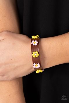 Pink and yellow beads bloom into vivacious flowers across the front of a brown leather band, bursting into a colorful floral accent. Features an adjustable sliding knot closure. Sold as one individual bracelet. Vintage Paparazzi, Adjustable Sliding Knot, Sparkly Accessories, Sliding Knot Closure, Slide Bracelet, Jewelry Catalog, Vip Group, Independent Consultant, Sliding Knot