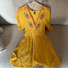 Dukes Of Dallas Brand, Never Worn, New With Tags, Size S, Flowy Fit And Waist Can Be Tightened, Embroidered Floral Designs, Great For Summer, Spring, Vacations Embroidered V-neck Summer Mini Dress, Summer V-neck Embroidered Mini Dress, Yellow Bohemian Mini Dress For Summer, Bohemian Mustard V-neck Dress, Mustard V-neck Bohemian Dress, Yellow Fitted Rayon Dress, Mustard Bohemian V-neck Dress, Flowy Mini Dress With Floral Embroidery, Fitted Yellow Rayon Dress