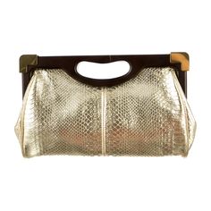 Rebecca Minkoff Lovers Clutch Metallic Gold Rebecca Minkoff Embossed Leather Clutch With Gold-Tone Hardware, Wooden Top Frame, Canvas Lining, Interior Zip Pocket, Interior Wall Pockets And Top Frame Magnetic Closure. Includes Dust Details Estimated Item Measurements Measurements: Height 8”, Width 12”, Depth 2” Frame Canvas, Wooden Tops, Interior Wall, Wall Pockets, Women Accessories Bags, Interior Walls, Leather Clutch, Magnetic Closure, Metallic Gold