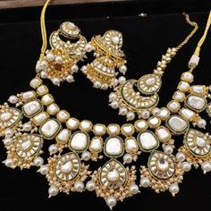 Gold Rodium Polish White and Off White color Necklace in Metal Alloy studded with CZ Diamond, Kundan, Pearl Maroon Necklace, Engagement Reception, Color Necklace, Metal Necklace, Waist Chain, White Necklace, Blue Necklace, Off White Color, Cz Diamond