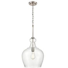 a glass light fixture hanging from the ceiling