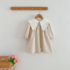 "Get ready to dress up your little one in style with our Cotton Dress! Made with soft cotton for all-day comfort, this long sleeve dress features a unique pointelle ruffled collar and front buttons for added charm. Perfect for any occasion, this dress is sure to make a statement." This item requires 10-14 days processing time before shipping. Ruffled Collar, Happy Mom, Summer Colors, Favorite Dress, Little Princess, Cotton Dress, Princess Dress, Cotton Dresses, Get Ready