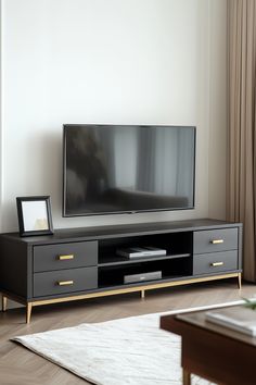 black tv stand under a mounted tv Modern Media Center, Wooden Tv Stands, Easy Backdrops, Media Unit, Media Cabinet, Electronic Engineering, Media Center, Wooden Stand, Industrial Chic