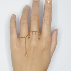 From our Elements collection, wear one or collect them all for the perfect stack! This ring is made with diamond cut bead chain, super shimmy fun with one round natural champagne diamond. Because it's a chain ring, we recommend to order a half size up. Details: -14k yellow gold -natural champagne round diamond -handmade in NYC Minimalist Open Ring With Single Cut Diamonds, Dainty Jewelry With Diamond Accents Open Ring, Silver 14k Gold Chain Ring With Diamond Accents, Fine Jewelry Open Ring With Single Diamond, Stackable Diamond Toe Ring Jewelry, Diamond Stackable Toe Ring Jewelry, Promise Stackable Diamond Jewelry, Stackable Diamond Promise Jewelry, Promise Diamond Stackable Jewelry