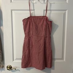 Never Worn Red Sleeveless Plaid Dress For Summer, Sleeveless Red Plaid Dress For Summer, Red Sleeveless Plaid Dress For Spring, Red Plaid Mini Dress For Spring, Casual Red Plaid Dress For Spring, Red Plaid Dress For Picnic In Spring, Red Plaid Dress For Spring Picnic, Cotton Gingham Sundress, Red Mini Dress For Spring Picnic