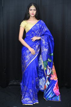 This authentic patachitra silk saree has an artistic depiction of motifs that illustrates a story. The painting on the saree is the handwork of the artists that the district of Puri is famous for. These are storytelling fabrics. This is a genuine handwoven piece, unevenness in the selvedge and weave could be expected, and colors may fade or bleed due to the traditional dyeing method employed. Specification: Occasion: Festive Wear Fabric: Sambalpuri Silk Primary Color: Blue Secondary Color: Multi Blue Kalamkari Print Saree For Festivals, Blue Katan Silk Saree With Kalamkari Print, Artistic Chanderi Saree With Printed Motifs, Artistic Silk Saree With Printed Motifs, Blue Katan Silk Dupatta With Kalamkari Print, Blue Art Silk Traditional Wear With Kalamkari Print, Artistic Saree With Printed Motifs In Traditional Drape, Artistic Saree With Printed Motifs For Festive Occasions, Artistic Tussar Silk Saree With Printed Motifs