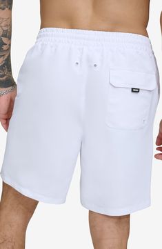 Hit the boardwalk or go for a swim in these volley swim trunks built from quick-drying fabric with UPF 40+ sun protection. 7" inseam (size Medium) Elastic/drawstring waist 100% REPREVE® recycled polyester REPREVE recycled polyester is made from 100% post-consumer recycled plastic bottles Machine wash, line dry Imported White Swim Trunks For Beachwear, White Swim Trunks For Outdoor Beachwear, White Beachwear Swim Trunks For Outdoor, White Shorts For Beach Season Outdoor Activities, White Beach Season Shorts For Outdoor, White Shorts For Outdoor Beach Season, White Summer Shorts For Outdoor, White Summer Bottoms For Outdoor, White Beach Season Outdoor Shorts