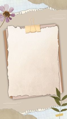 a piece of paper with a note pinned to it and a flower on the side