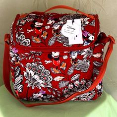 Vera Bradley Quality And Style Meet Disney's Iconic Characters, Mickey And Minnie Mouse, To Create This Fun, Fabulous, And Oh-So-Functional, Authentic Vera Bradley Crossbody Lunch Tote Bag! Featured In An Adorable "Mickey And Minnie's Flirty Floral" Motif -- Brand New -- Never Used! *Please Note: The Bag In The Photos Is The Actual Bag I Currently Have Available. Lunch Crossbody Bag: -Exterior: Quilted Cotton -Insulated Interior -Zip Closure -Exterior: Side Slip Pocket -Top Handle: 2" Drop -Adju Disney Shoulder Bag With Removable Pouch For Travel, Disney Style Travel Shoulder Satchel Bag, Disney Shoulder Bag With Adjustable Strap For Travel, Disney Rectangular Shoulder Bag For Travel, Disney Style Rectangular Shoulder Bag For Travel, Disney Travel Bag With Removable Pouch, Disney Rectangular Travel Bag, Disney Crossbody Bags For Disney Trips, Disney Style Crossbody Bags For Disney Trips