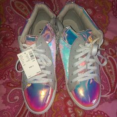 Zip Up/Lace Up Sneakers Holographic For All You Holosexuals Out There Bnwt *Never Worn* Bottom Of Sneakers Slightly Discolored Due To Trying On In Store. They Don’t Have Carpeting/Rugs Trendy Iridescent Lace-up Sneakers, Casual Metallic Sneakers With Glitter, Casual Metallic Glitter Sneakers, Casual Iridescent Sneakers For Streetwear, Casual Multicolor Glitter Sneakers, Trendy Iridescent Low-top Sneakers, Multicolor Casual Party Sneakers, Casual Multicolor Party Sneakers, Casual Sequin Sneakers With Round Toe