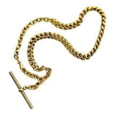 This is part of Chairish’s Fine Jewelry assortment.  This 14k gold watch chain has a fabulous hollow link interwoven with tiny balls for an unusual variation of a curb link. The links are carved with a ribbed texture that give a matte surface to the gold. This creates a unique visual texture that almost gives the illusion that the lines of the chain are blurry or out of focus. The tiny balls add a vertebrae-like element that reinforces the chain and make its movement serpentine.   At each end of Antique Gold Chain Necklace For Formal Occasions, Antique Style Formal Chain Necklace, Heirloom Curb Chain Necklace For Formal Occasions, Antique Yellow Gold Chain Necklace For Formal Events, Heirloom Style Curb Chain Necklace For Formal Occasions, Victorian Wheat Chain Necklace For Formal Occasions, Victorian Gold Chain Necklace For Formal Occasions, Antique Curb Chain Necklaces For Formal Occasions, Antique Link Necklaces For Formal Occasions