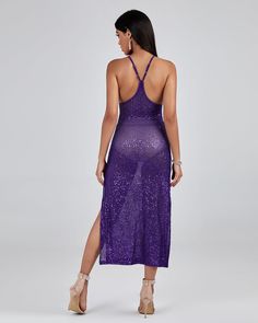 Our Purple Sequin Strap Midi Dress is the perfect combination of style and comfort. Crafted from lightweight and breathable material, this dress is sure to be your go-to for any occasion. The purple sequins add a touch of luxury to the dress. The adjustable straps also provide a comfortable fit. Make a statement with this elegant and sophisticated dress. Our Style No.SZMG081508 Bead Piece Height - 66.9"/170cm Bust - 33.8"/86cm Waist - 24.4"/62cm Hips - 36.2"/92cm and wears size S About Wholesale Glamorous Fitted Sequin Beach Dress, Glamorous Fitted Sequin Dress For Beach, Sequin Mini Dress For Beach Parties, Sequined Mini Dress For Beach Party Season, Purple Sleeveless Sequin Dress With Contrast Sequin, Sleeveless Purple Sequin Dress With Contrast Sequin, Purple Sleeveless Dress With Contrast Sequin, Glamorous Sequin Beach Dress, Purple Contrast Sequin Sleeveless Dress