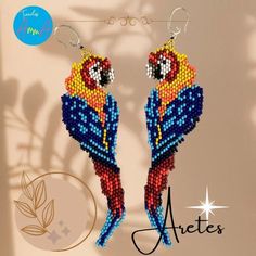 the beaded parrot earrings are made with beads and glass beads, which have been designed to look like tropical birds