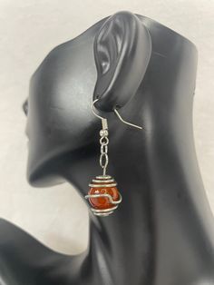 These versatile dangle earrings are a graceful combination of wire and bead.  We chose to use a simple black bead because it can easily be integrated into most any wardrobe.   Want a different color bead?  Prefer copper to silver?  Send us a quick message and we'll make sure to give custom order our full attention. **Please note that all handmade are unique, so there may be some slight differences between the item pictured in our store and what we send out to you.  If such a variance occurs, we will include an image of the item made for you before shipping to ensure that it meets with your approval.** Ladies Night, Tiffany Heart, Heart Charm Bracelet, Black Beads, Jewelry Earrings Dangle, Different Colors, Dangle Drop Earrings, Dangle Earrings, Jewelry Earrings