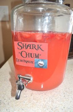 a jar filled with liquid sitting on top of a counter