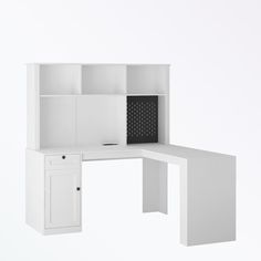 an office desk with a white bookcase and cupboards