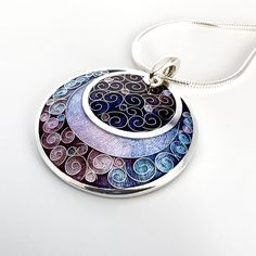 Please note this item is made to order.   Handcrafted with meticulous attention to detail, this pendant features a mesmerizing purple moon suspended in a darkened swirl sky, meticulously crafted with vibrant enamel. The deep purple hues are reminiscent of a magical twilight, exuding an ethereal charm that will surely leave admirers in awe! The Purple Moon Enamel Pendant is more than just a beautiful piece of jewelry; it also carries a symbolic meaning. The moon is often associated with femininit Cloisonne Enamel Jewelry, Cloisonne Jewelry, Purple Moon, Vitreous Enamel, Cloisonne Enamel, Crafts Beautiful, Love Craft, Enamels, Purple Hues