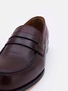 Color: bordeaux Cow leather with natural finish Penny front Leather insoles Rubber and leather soles Hand-stitched detailing Semi-formal Moccasins With Stitched Sole And Round Toe, Burgundy Slip-on Formal Loafers, Burgundy Slip-on Loafers For Formal Occasions, Burgundy Slip-on Leather Shoes For Business, Burgundy Slip-on Dress Shoes For Business, Burgundy Leather Shoes With Plain Toe, Burgundy Leather Loafers For Business, Burgundy Loafers With Rubber Sole And Round Toe, Burgundy Oxfords With Rubber Sole And Plain Toe