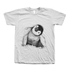 Penguin Tshirt, Unisex T-shirt, Mens T-shirt, Cute Animal Print Tee, , Emperor Penguin, Bird Shrit, Birthday gift, Penguin Shirt Hand pressed in California by Couth. Printed on Fine Jersey Short Sleeve T Fine Jersey (100% Cotton) construction (Heather Grey contains 10% Polyester). Sizing: Before ordering PLEASE CHECK our size/color chart (last picture of the listing) for measurements, we recommend to size up if you are in between sizes. The best way to estimate size is to pick a shirt that fits the best and compare it to our chart. All our measurements are taken with the shirt laid flat. Please contact us if you need more information about sizes. Please Select your T-shirt's size and color at checkout from the drop down menu on the right and please check the measurements from our size char Unisex White T-shirt With Funny Print, Unisex Sublimation Print Crew Neck T-shirt, Funny Tri-blend T-shirt With Screen Print, White Tri-blend Short Sleeve T-shirt, Funny Crew Neck T-shirt With Sublimation Print, Short Sleeve T-shirt With Sublimation Print, Relaxed Fit Screen Print T-shirt As Gift, Relaxed Fit Screen Print T-shirt For Gift, Graphic Tee T-shirt With Relaxed Fit As Gift