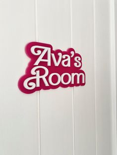 a red sign that says ava's room on the side of a white door