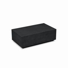 a large black box sitting on top of a white surface with the lid open and no one around it