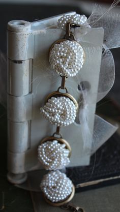 "How cool is this? Pefectly preserved pearly white bead clip on earrings, vintage 50's and 60's, make this a really fun bracelet, that definitely makes people take notice. This is a rich looking bracelet that can be dressed up or down. These earrings are harder to find than I thought they would be. But the hunt sure is fun. 7 1/2\" long. I work with antique and vintage parts. Some may show signs of wear or age. Please look at each picture closely. I have tried to show all aspects of my work. Ple Vintage Pearl Clip-on Earrings For Gift, Vintage Pearl Clip-on Earrings As Gift, Vintage Pearl Clip-on Earrings, Vintage Pearl Drop Clip-on Earrings, Vintage White Pearl Clip-on Earrings, Vintage Adjustable Pearl White Jewelry, Adjustable Vintage Pearl White Jewelry, Vintage Pearl White Jewelry For Party, White Pearl Button Jewelry For Party