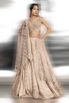 Pink lehenga with separate cancan, embellished with resham, sequin, pearl, cutdana in a fine play of geometric lines, imitating underwater coral reefs. Paired with sleeveless blouse and dupatta.
Components: 4
Pattern: Embellished
Type Of Work: Resham, sequin, pearl, cutdana, geometric, coral reefs
Neckline: Broad round neck
Sleeve Type: Sleeveless
Fabric: Silk Organza, Net, Power Net, Voile
Color: Pink
Other Details: 
Applique border embroidered dupatta
Cutwork border
Pearl embellishment on shou Unstitched Hand Embellished Lehenga In Organza, Hand Embellished Organza Set For Diwali, Hand Embellished Anarkali Organza Sets, Semi-stitched Hand Embellished Lehenga For Eid, Hand Embellished Semi-stitched Lehenga For Eid, Diwali Hand Embellished Organza Lehenga, Hand Embellished Sets For Diwali Reception, Diwali Reception Hand Embellished Sets, Unstitched Hand Embellished Lehenga For Reception