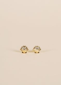 Our petite seashell earrings with etched detailing are lightweight, and perfect in first, second or third piercings. Pair with your favorite gold hoops or studs for the ultimate ear stack. Tarnish Free - Long lasting protective coating safeguarding your jewelry from sweat, water, and more.Sterling Silver Posts – 18K gold plating over brassHypoallergenic – Lead Free The studs are 6mm x 7 mm Yellow Gold Shell-shaped Earrings, Yellow Gold Shell-shaped Earrings For Pierced Ears, Single Shell-shaped Gold Earring, Shell-shaped Yellow Gold Earrings Gift, Shell-shaped Yellow Gold Earrings For Gifts, Yellow Gold Shell-shaped Earrings Gift, Bar Post, Seashell Earrings, Planner Pens