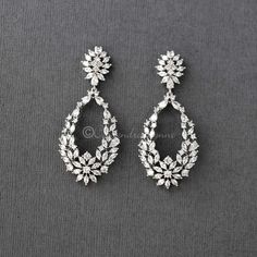 Intricately designed teardrop shaped earrings created with marquise, pear and round CZ jewels. A stunning choice for any special occasion! They are 2.25 inches long, rhodium or rose gold plated, grade AAA CZ, lead and nickel free. Infinite Money, Long Diamond Earrings, Rose Gold Bridal Earrings, Silver Bridal Earrings, Model Blouse, Diamond Mangalsutra, Diamond Necklace Designs, Bridal Earrings Drop, Jewelry Drawing