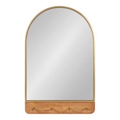 Enhance your cozy farmhouse home with the Schuyler mirror, a piece of wall decor that blends fashion and function within its robust design. This beautiful mirror features a two-tone natural wood and gold finish, creating a stylish look that fits into various color schemes throughout the home. The Schuyler is an arched mirror that features four wooden pegs. The metal frame is constructed from resilient iron, allowing it to last multiple years of high-quality display. This accent piece is fantasti Entry Wall Mirror, Wall Mirror With Hooks, Arch Wall Mirror, Wood And Gold, Entry Wall, Arch Wall, Mirror With Hooks, Beautiful Mirror, Arched Mirror