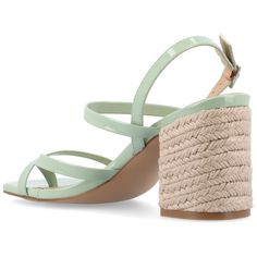 Step into summer elegance with the Olivina sandal from Journee Collection, featuring a chic espadrille heel for a trendy touch. Crafted with faux leather, these sandals showcase an open toe and an ankle strap with a buckle closure, adding both style and security to your ensemble. The 3- inch block heel, complemented by the 4 mm Tru Comfort Foam™ footbed and man-made outer sole, ensures a fashionable and comfortable stride for any warm-weather occasion. Summer Sandals With Stacked Heel And Ankle Strap, Beach Heels With Padded Heel And Ankle Strap, Summer Stacked Heel Slingback Sandals With Ankle Strap, Summer Slingback Sandals With Stacked Heel And Ankle Strap, Summer Vacation Slingback Sandals With Block Heel, Chic Block Heel Slingback Sandals For Beach, Summer Sandals With Heel Strap And Block Heel, Beach Sandals With Padded Block Heel, Summer Beach Sandals With Padded Heel