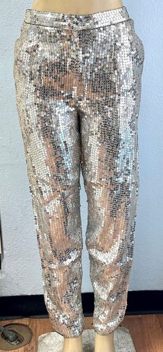 This elegant sequined dress pant is hand beaded to perfection with sequins and beads all around.  This is for sure an elegant dress pant for special events, weddings, parties, anniversaries, romantic dinners, red carpets, etc Womens Trousers, Sequined Dress, Red Carpets, Romantic Dinners, Dress Pant, Hand Beading, Elegant Dress, Sequin Dress, Trousers Women